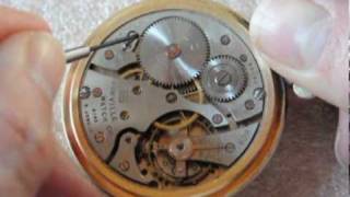 How to unwind a pocket watch mainspring [upl. by Anailuj881]