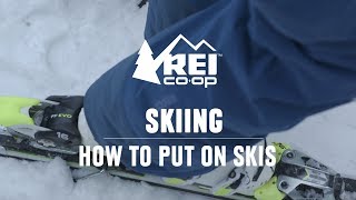 How to Put on Skis  REI [upl. by Rephotsirhc]