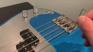 How to adjust string height on a bass guitar [upl. by Solracesoj410]