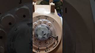 How to dial a rotary dial telephone [upl. by Adnerol947]