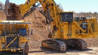 Caterpillar 6060 Face Shovel loading Autonomous Trucks [upl. by Solitta]