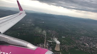 Wizz Air A320 cloudy descent and landing at Prishtina Airport [upl. by Revorg843]